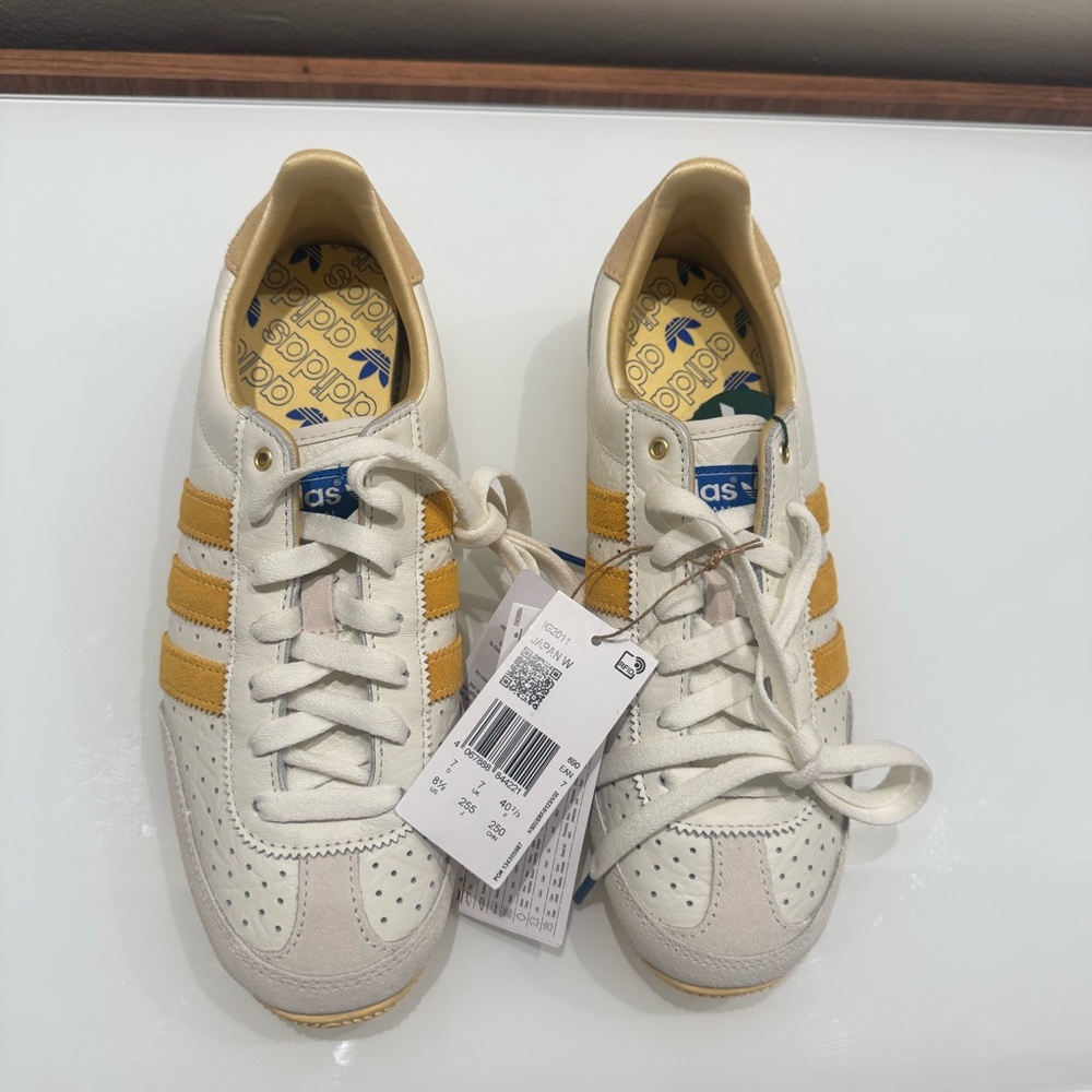 Adidas Originals Japan low sneakers in white and yellow